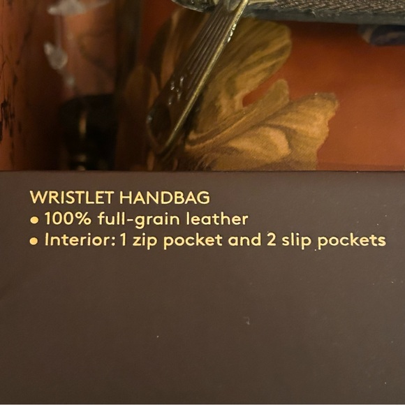 Brand New Patricia Nash fold over leather wristlet (still in & attached to box)